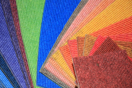 商店的地毯手表纺织品样本地面材料面料零售织物装潢展示收藏背景图片