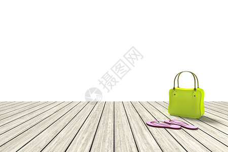 白色背景木地板上的绿色袋子背景图片