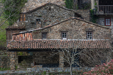 葡萄牙典型的先歇式家庭房子游客旅行片岩岩石乡村手工工艺丑闻建筑学背景图片