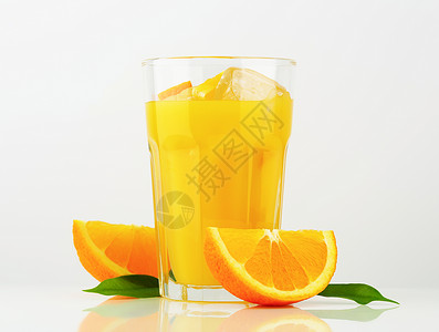 橙汁杯子果汁水果冷饮橙子冰块饮料冷藏背景图片
