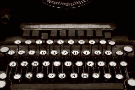 古董压捆机德国古董打字机机钥匙贴近照片背景