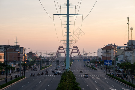 介绍信范文Binh Loi桥的交通堵车 VIETNAM红绿灯日出立交桥方向旅行天空电源线闪电范文建筑背景