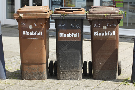 再循环回收垃圾箱棕色垃圾桶垃圾食物背景图片
