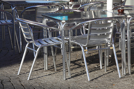 银金属桌椅餐厅行业椅子桌子排椅餐饮咖啡店外贸背景图片