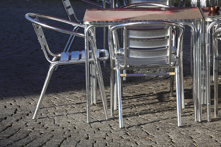 银金属桌椅桌子咖啡店行业排椅椅子餐饮外贸餐厅背景图片