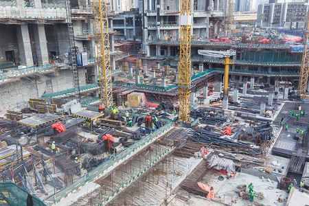 混凝土泵现代建筑物凝聚现场工程劳动者摩天大楼城市地面建设者机械水泥基金会团队工作服背景