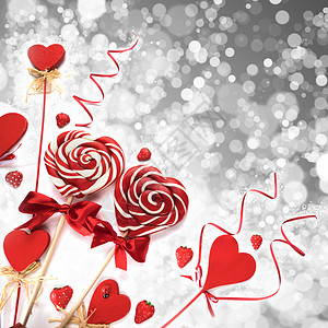 棒棒糖和心装饰背景丝带条纹白色糖果礼物瓢虫红色风格背景图片