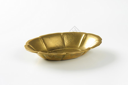 花形金金金属碗装饰餐具椭圆形盘子风格金子背景图片