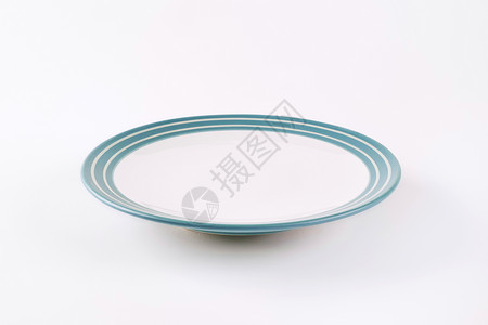 白色和蓝色空白板制品餐具圆形轮缘陶瓷陶器盘子背景图片