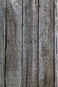 深色木质背景与垂直木板的特写背景图片