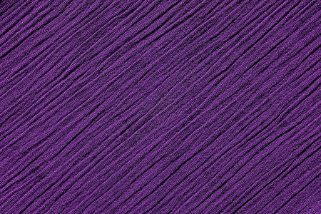 深紫色起皱纹织物背景纹理背景图片