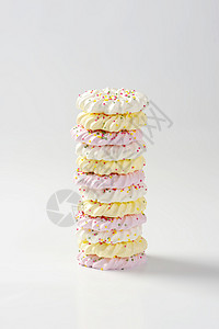 美英饼干糖果花圈形食物黄色粉色装饰小雨配料背景图片