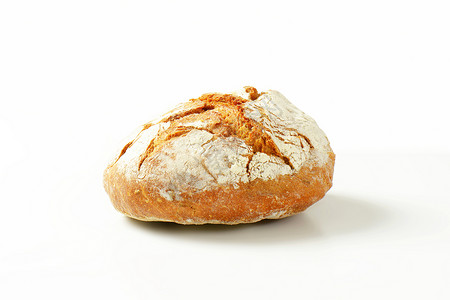 一块面包食物硬皮圆形工匠背景图片