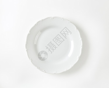 高级白餐盘高架白色轮缘圆形制品餐具盘子陶瓷边缘陶器背景图片