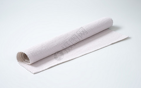 白布边垫白色折叠织物台垫纺织品背景图片