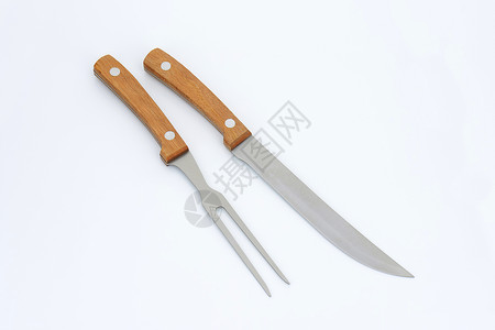雕刻刀和叉用具菜刀服务器具厨房套装木柄金属背景图片