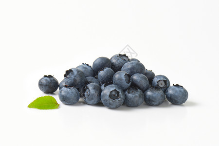 新鲜蓝莓的堆积浆果食物团体背景图片