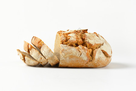 新鲜的结壳面包圆形硬皮工匠食物背景图片