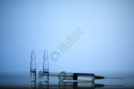 Syringne和Ampoulles小瓶药品制药氨基疫苗玻璃兴奋剂实验室注射治疗背景图片
