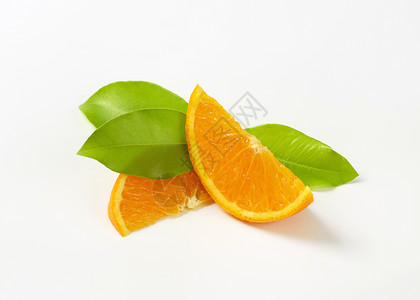 新鲜橙红切片水果楔子食物背景图片