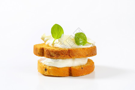 切块乳酪面包含奶油奶酪的面包面包饼干面包片小吃美味点心草本植物食物背景