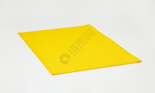 矩形黄色方形编织台垫背景图片