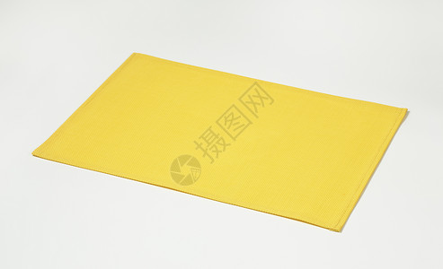 矩形黄色地皮台垫编织背景图片