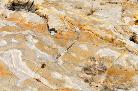 特写石头背景的纹理石质石灰石岩石巨石砂岩灰色材料宏观矿物花岗岩石质的高清图片素材