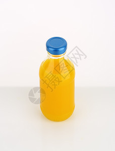 橙汁瓶饮料橙子液体玻璃蓝色水果果汁食物背景图片