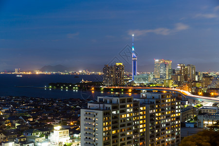 福冈市景观海岸场景旅行建筑地标天际摩天大楼商业日落背景图片