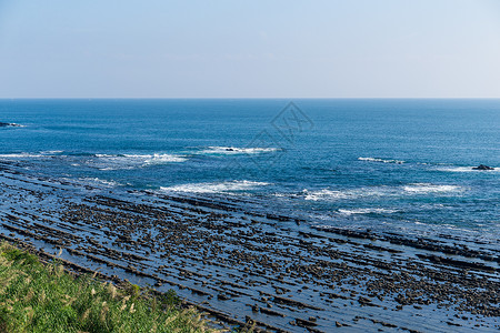 青岛岛海岸海浪石头冲浪天空海景晴天阳光公园海洋蓝色高清图片