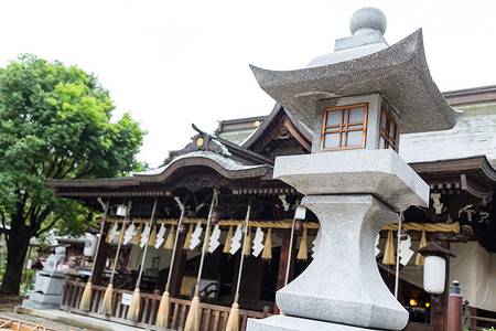 日本寺庙的石灯艺术花园旅游装饰品岩石石头盆栽叶子灯笼文化背景图片