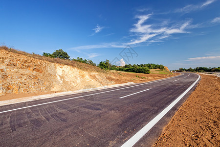 新沥青道路交通材料太阳自由地平线赛道运输柏油天空速度石头高清图片素材