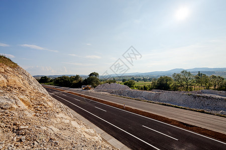 新沥青道路蓝色速度运动路线自由材料赛道柏油太阳色彩交通高清图片素材