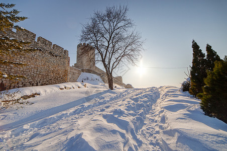 雪堡垒堡垒墙的一部分蓝色土地白色雪原长廊建筑学天际石头背景