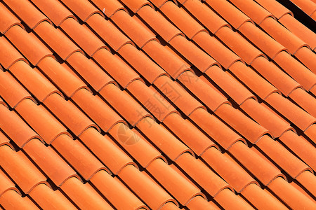 红色瓷砖屋顶瓷砖条纹红色制品卵石材料房子陶瓷平铺住宅橙子背景