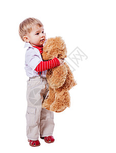 男孩抱抱熊快乐孩子喜悦幸福白色男性玩具拥抱金发乐趣背景