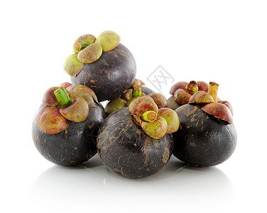 白色背景的芒果反射维生素藤黄紫色水果异能热带营养甜点食物背景图片