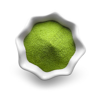白色背景的碗中的绿茶粉粉末食物草本饮料仪式粉状抹茶健康文化背景图片