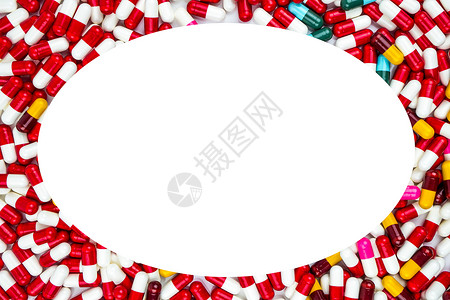 五颜六色的抗生素胶囊药丸椭圆形框架在白色背景与复制空间 耐药性概念 抗生素用药具有合理的全球保健理念 医药行业 药学背景背景图片
