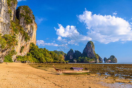 美丽瓦登海日落时低潮水和船 在拉莱海滩的通赛湾旅行太阳假期海滩屁股泥滩海洋海岸线钓鱼岩石背景