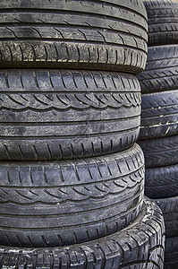 旧轮胎维修团体环境垃圾场工业车轮黑色回收汽车材料背景图片