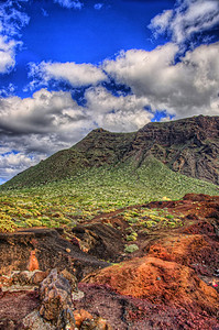 阳光明媚的一天 在加那利岛Punto Teno灯塔附近的Tenerife西北西北海岸 蓝天云云和绿地有山脉风景蓝色环境全景旅游天夏天高清图片素材