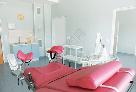 在现代医院的手术室里治疗外科手术聚光灯妇科疾病房间工作诊所背景图片