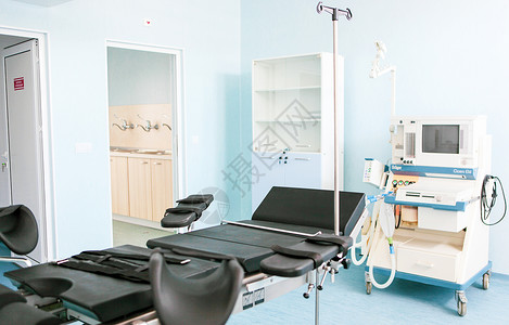 在现代医院的手术室里治疗外科聚光灯诊所房间手术工作妇科疾病背景图片