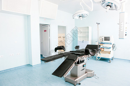 在现代医院的手术室里房间妇科手术诊所疾病工作聚光灯治疗外科背景图片