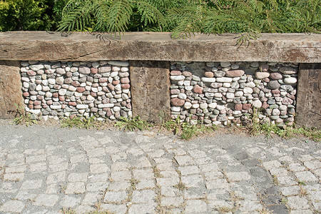 鹅卵石铺成的街道纹理背景岩石铺路小路地面石头花岗岩人行道路面正方形背景图片