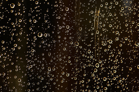水滴粒子玻璃窗户反射气泡背景宏观背景图片