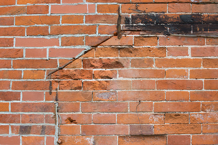 红砖石墙或背景石头墙纸木头建造古董建筑学材料风化水泥金属背景图片