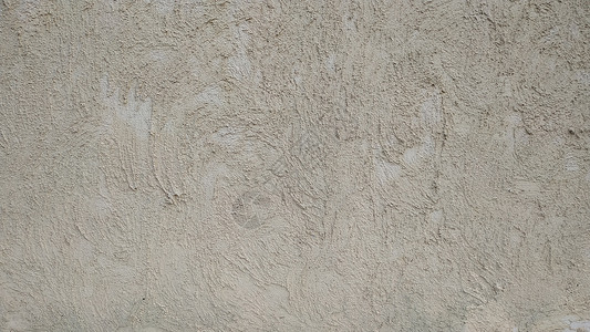 抹灰石膏墙上覆盖着粗糙的水泥灰色灰泥 背景 特写镜头背景